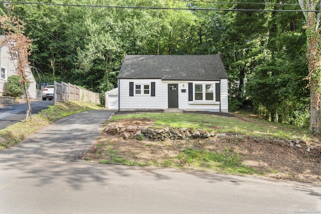 17 Norwood Rd, New Haven, CT 06513 - view of front of home featuring roof with shingles and a garage