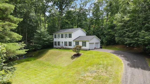 195 Crane Hollow Rd, Bethlehem, CT 06751 - colonial-style house with driveway, a front yard, and an attached garage