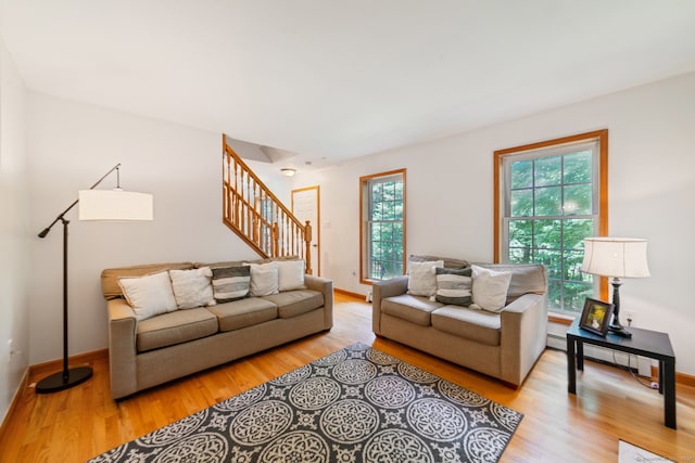 195 Crane Hollow Rd, Bethlehem, CT 06751 - living area featuring stairway, light wood-type flooring, and baseboard heating