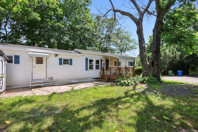 133 W Main St Trlr C6, Clinton, CT 06413 - view of front of home with a front lawn and a deck