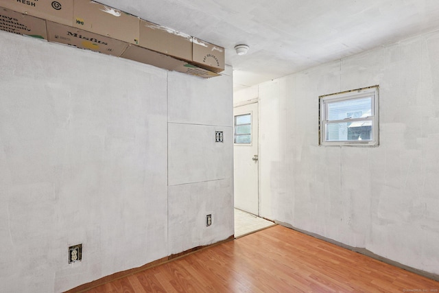133 W Main St Trlr C6, Clinton, CT 06413 - empty room with wood finished floors and a smoke detector