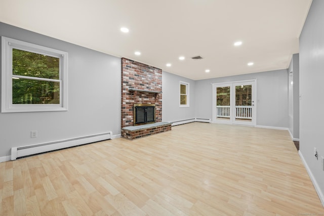 7 Woodmont Rd, Avon, CT 06001 - unfurnished living room featuring a baseboard radiator, wood finished floors, recessed lighting, and a brick fireplace