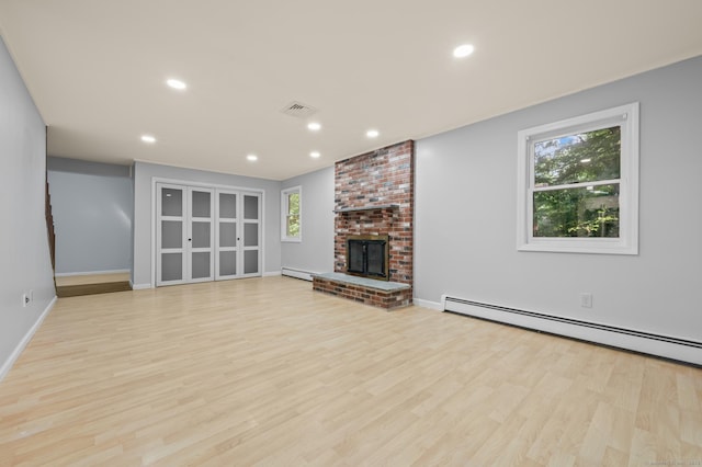 7 Woodmont Rd, Avon, CT 06001 - unfurnished living room with wood finished floors, baseboard heating, healthy amount of natural light, and recessed lighting