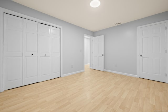 7 Woodmont Rd, Avon, CT 06001 - unfurnished bedroom with light wood-type flooring and a closet