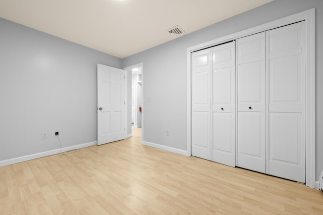 7 Woodmont Rd, Avon, CT 06001 - unfurnished bedroom with light wood-type flooring and a closet