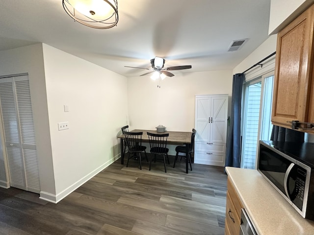 63 Coleman St Apt 14, East Haven, CT 06512 - dining area with dark wood-type flooring and a ceiling fan