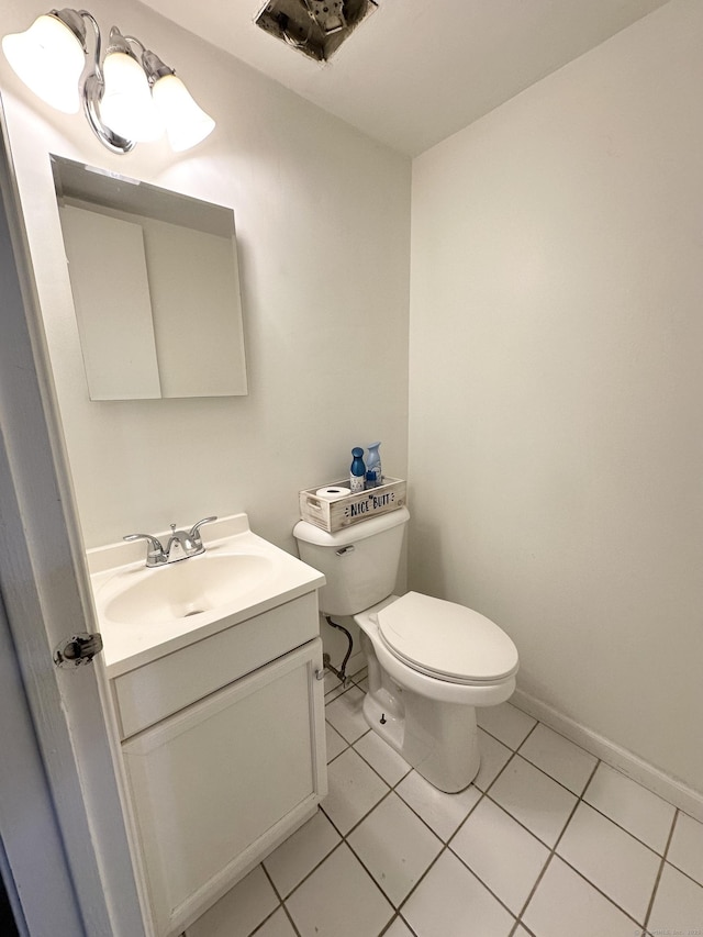 63 Coleman St Apt 14, East Haven, CT 06512 - half bath featuring vanity and tile patterned flooring