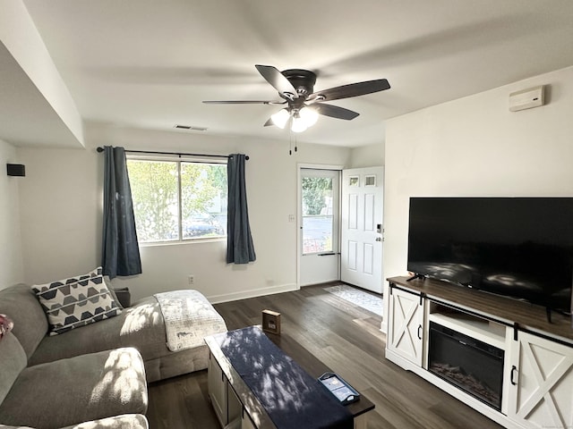 63 Coleman St Apt 14, East Haven, CT 06512 - living area with a ceiling fan and dark wood-style flooring