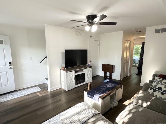 63 Coleman St Apt 14, East Haven, CT 06512 - living room featuring dark wood-style flooring, ceiling fan, and stairway