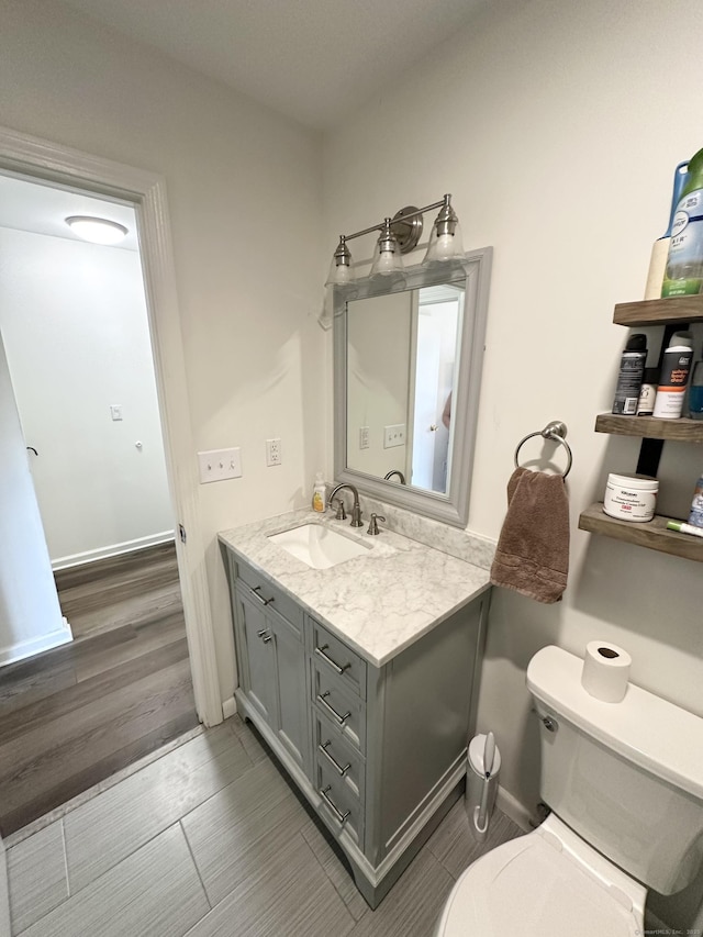 63 Coleman St Apt 14, East Haven, CT 06512 - half bath with vanity and wood finished floors