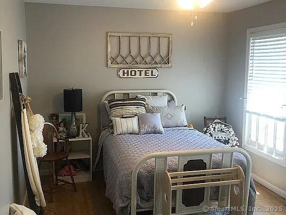 26 Julia Ln, Thomaston, CT 06787 - bedroom featuring multiple windows and wood finished floors
