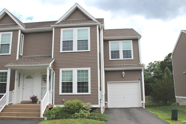 3 Holly Ln Unit 3, Farmington, CT 06085 - townhome / multi-family property featuring a garage, driveway, and a shingled roof
