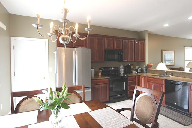 3 Holly Ln Unit 3, Farmington, CT 06085 - kitchen with black appliances, a chandelier, recessed lighting, light tile patterned floors, and dark countertops