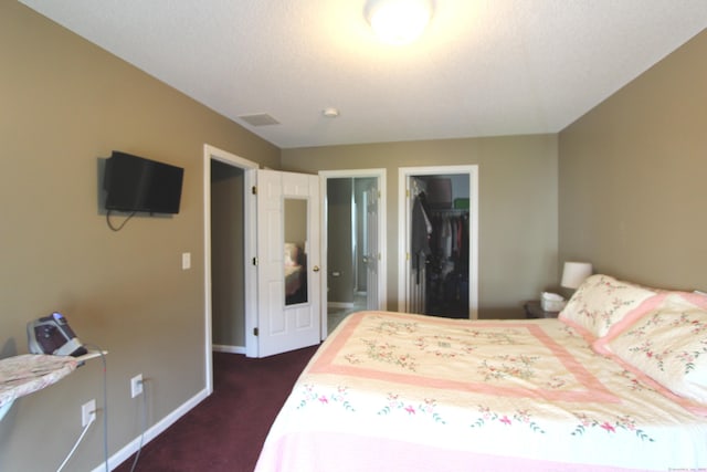 3 Holly Ln Unit 3, Farmington, CT 06085 - bedroom featuring dark carpet and a spacious closet