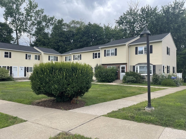 56 Elm St Apt 36, Enfield, CT 06082 - view of front facade with a front yard