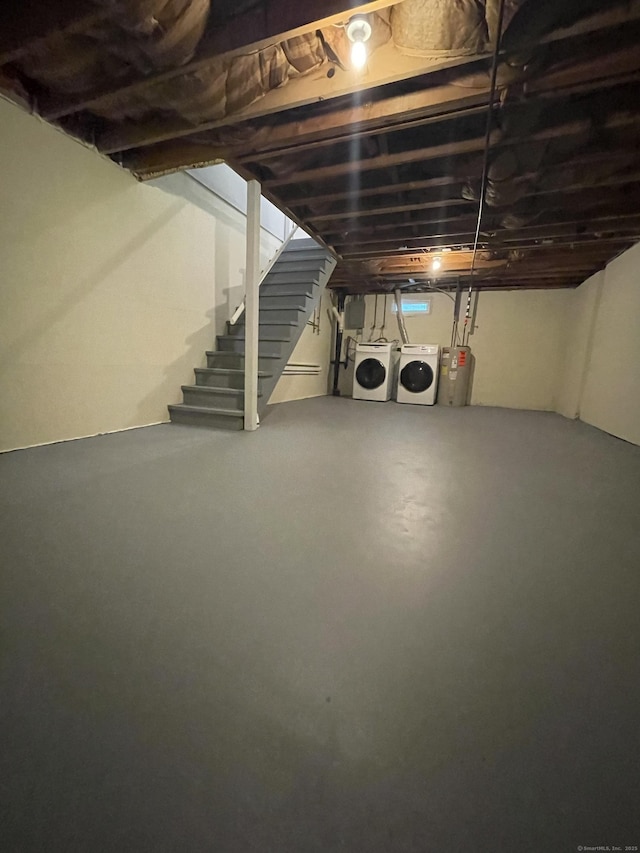 56 Elm St Apt 36, Enfield, CT 06082 - unfinished basement with independent washer and dryer, stairs, and electric water heater