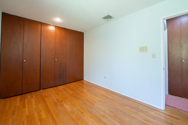 87 Pleasant Dr, Bethany, CT 06524 - unfurnished bedroom featuring light wood-style flooring and a closet