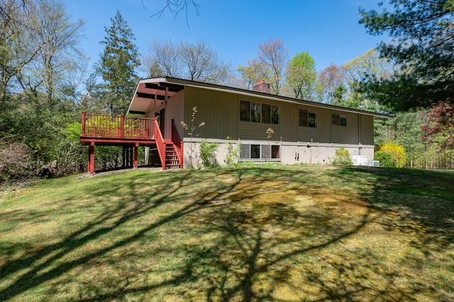87 Pleasant Dr, Bethany, CT 06524 - rear view of property with stairs, a wooden deck, a chimney, and a yard
