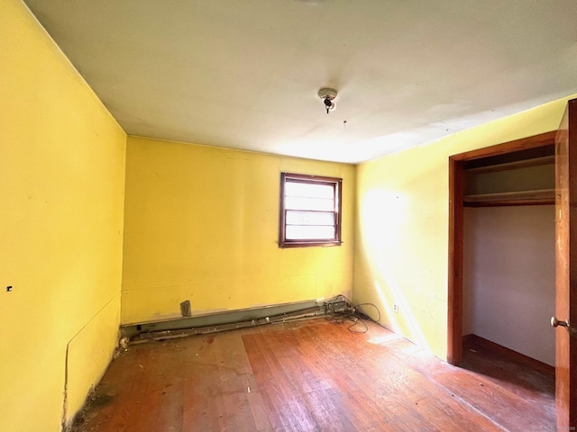 65 Masarik Ave, Stratford, CT 06615 - unfurnished bedroom with a closet and wood finished floors