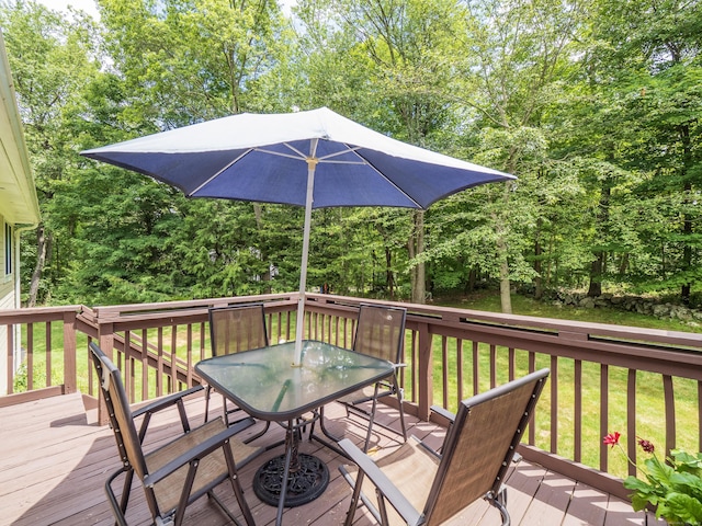 58 Longmeadows Rd, Wilton, CT 06897 - wooden terrace featuring outdoor dining space, a yard, and view of scattered trees