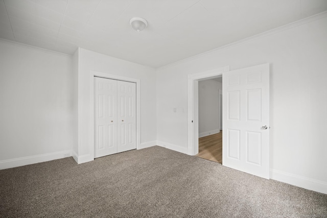 220 Hillside Ave, Waterbury, CT 06710 - unfurnished bedroom featuring carpet flooring, ornamental molding, and a closet