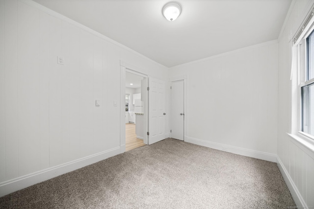 220 Hillside Ave, Waterbury, CT 06710 - carpeted spare room featuring baseboards