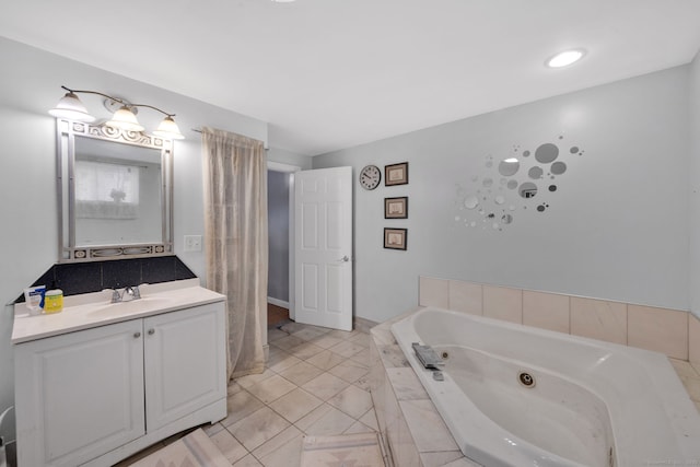 53 Wells Ave, East Hartford, CT 06108 - bathroom with a tub with jets and vanity