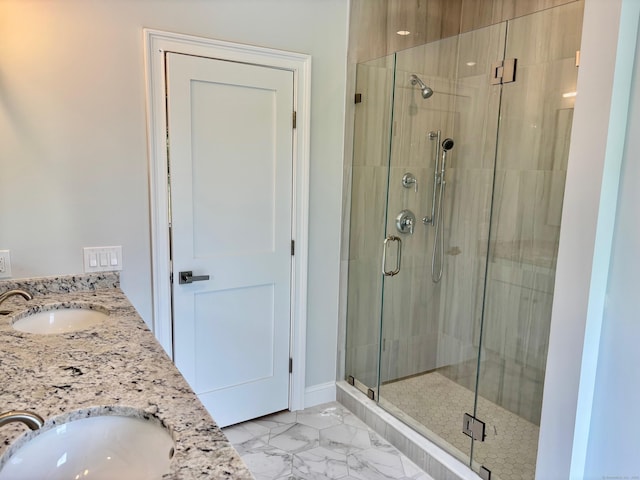 2 Gary Knls, Danbury, CT 06810 - bathroom featuring a stall shower, marble look tiles, and double vanity