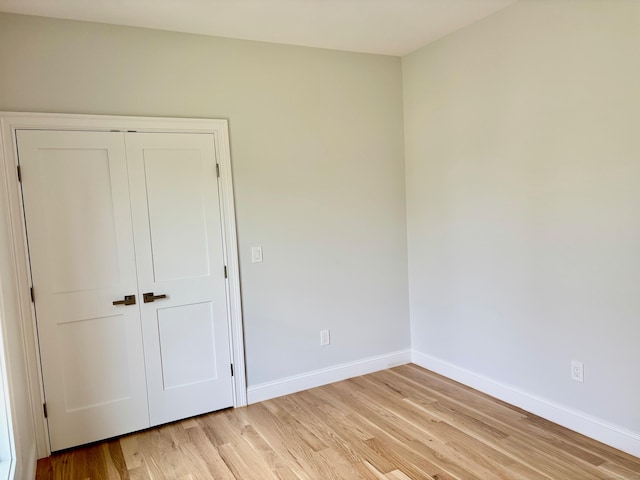 2 Gary Knls, Danbury, CT 06810 - unfurnished bedroom with light wood-style floors and a closet
