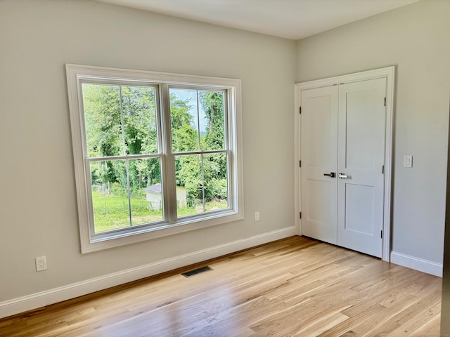 2 Gary Knls, Danbury, CT 06810 - unfurnished bedroom featuring light wood-style floors and a closet