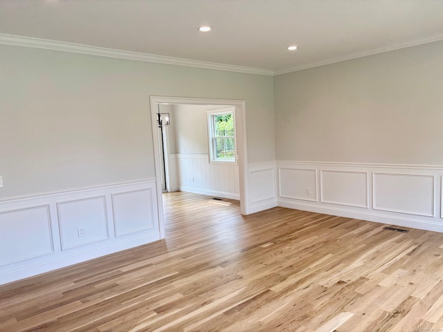 2 Gary Knls, Danbury, CT 06810 - empty room with ornamental molding, light wood-style floors, a wainscoted wall, and recessed lighting
