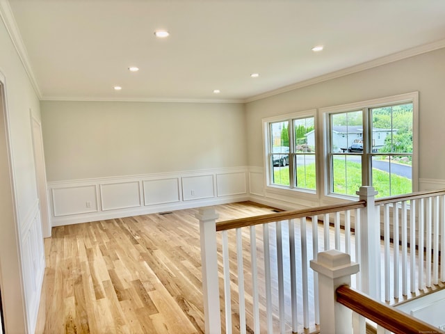 2 Gary Knls, Danbury, CT 06810 - spare room with light wood-type flooring, a wainscoted wall, recessed lighting, and a decorative wall