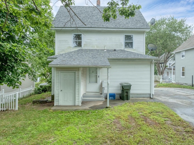 17 Walden Ave, New London, CT 06320 - back of house with entry steps, a shingled roof, and a chimney