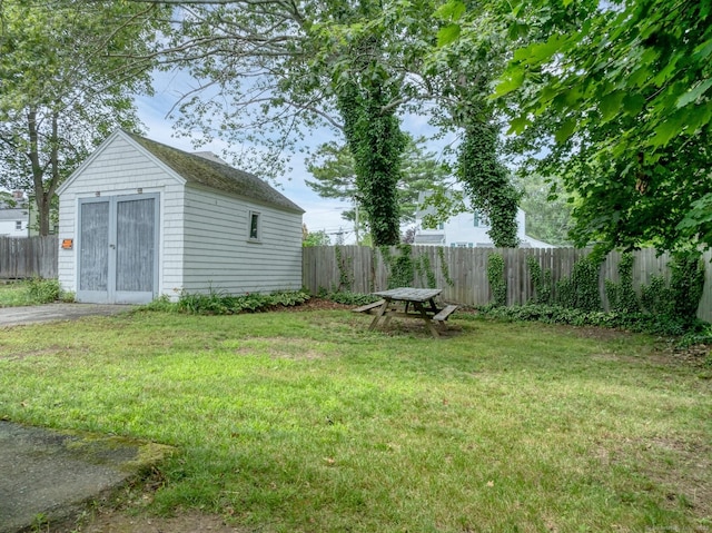 17 Walden Ave, New London, CT 06320 - fenced backyard featuring a storage unit