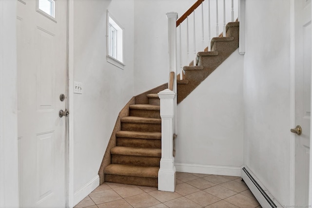 17 Walden Ave, New London, CT 06320 - entrance foyer featuring a baseboard heating unit, stairway, and light tile patterned floors