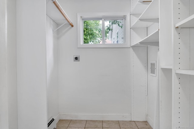 17 Walden Ave, New London, CT 06320 - spacious closet featuring baseboard heating and light tile patterned floors