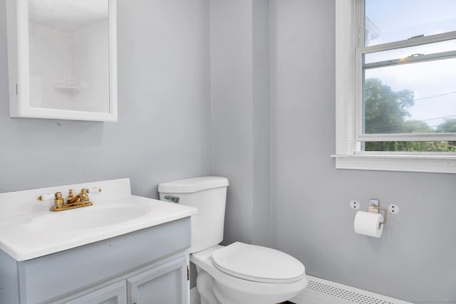 17 Walden Ave, New London, CT 06320 - bathroom featuring plenty of natural light, vanity, and a baseboard radiator