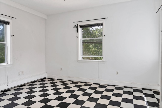 17 Walden Ave, New London, CT 06320 - spare room featuring tile patterned floors, healthy amount of natural light, and a baseboard radiator