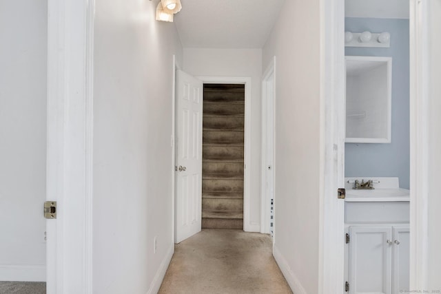 17 Walden Ave, New London, CT 06320 - corridor with baseboards and concrete flooring