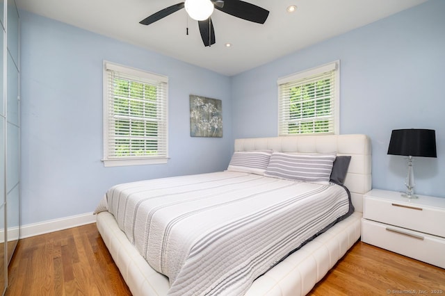 285 Westover Rd, Stamford, CT 06902 - bedroom with multiple windows, light wood-type flooring, recessed lighting, and ceiling fan