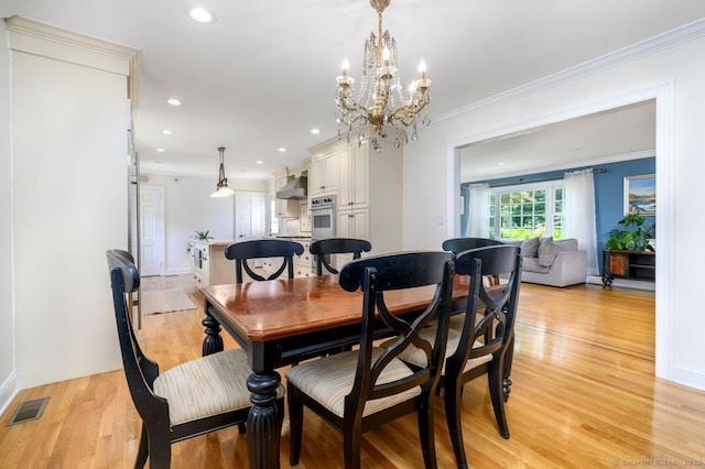 285 Westover Rd, Stamford, CT 06902 - dining area with light wood-style flooring, a chandelier, recessed lighting, and crown molding