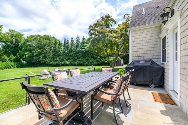 285 Westover Rd, Stamford, CT 06902 - view of patio with outdoor dining space, a grill, and a storage shed