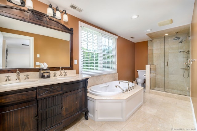285 Westover Rd, Stamford, CT 06902 - full bath with a shower stall, double vanity, a bath, tile patterned flooring, and recessed lighting