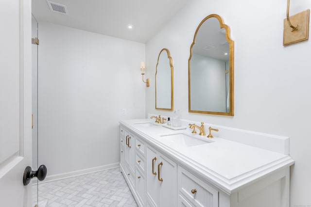 10 Pine Brook Ln Unit 10, Darien, CT 06820 - bathroom featuring double vanity, brick patterned flooring, and recessed lighting