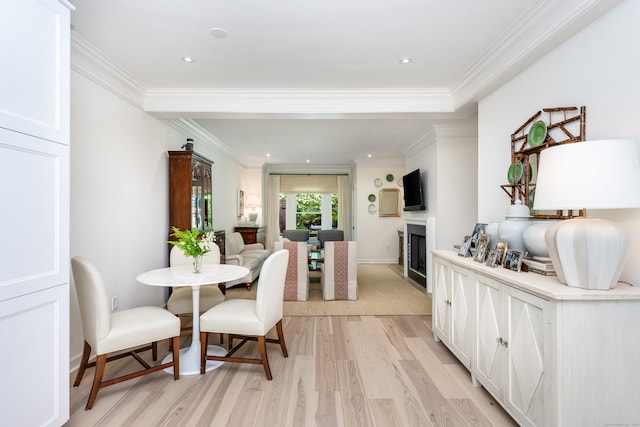 10 Pine Brook Ln Unit 10, Darien, CT 06820 - dining space featuring light wood-style floors, a fireplace, crown molding, and recessed lighting