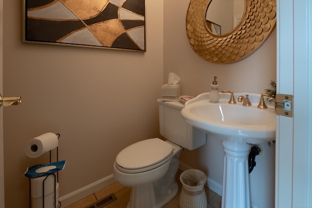 29 S Village Rd Unit 29, Branford, CT 06405 - half bathroom featuring toilet and tile patterned floors