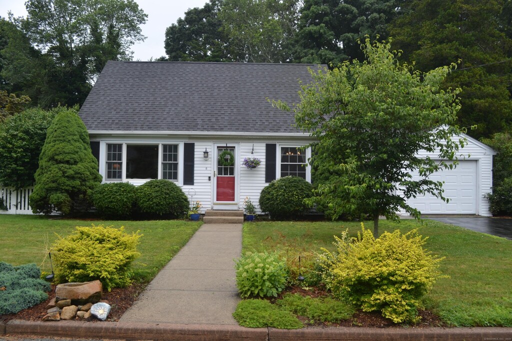 8 Deborah St, Waterford, CT 06385 - cape cod-style house featuring a front lawn, a shingled roof, and asphalt driveway