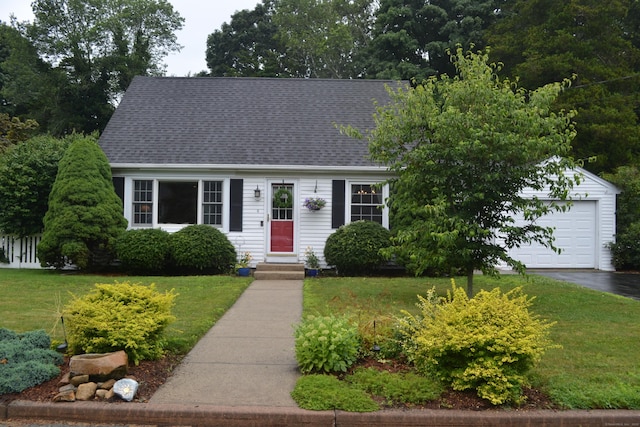 8 Deborah St, Waterford, CT 06385 - cape cod-style house featuring a front lawn, a shingled roof, and asphalt driveway