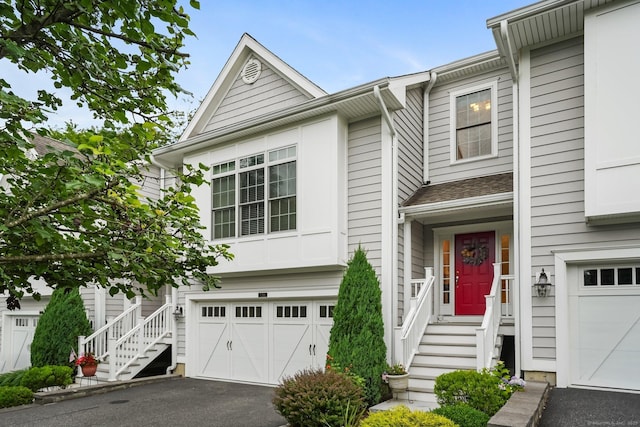 7 Still Water Cir Unit 7, Brookfield, CT 06804 - view of front of house with an attached garage and asphalt driveway