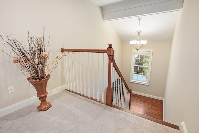 7 Still Water Cir Unit 7, Brookfield, CT 06804 - stairs with a chandelier, lofted ceiling, and carpet floors